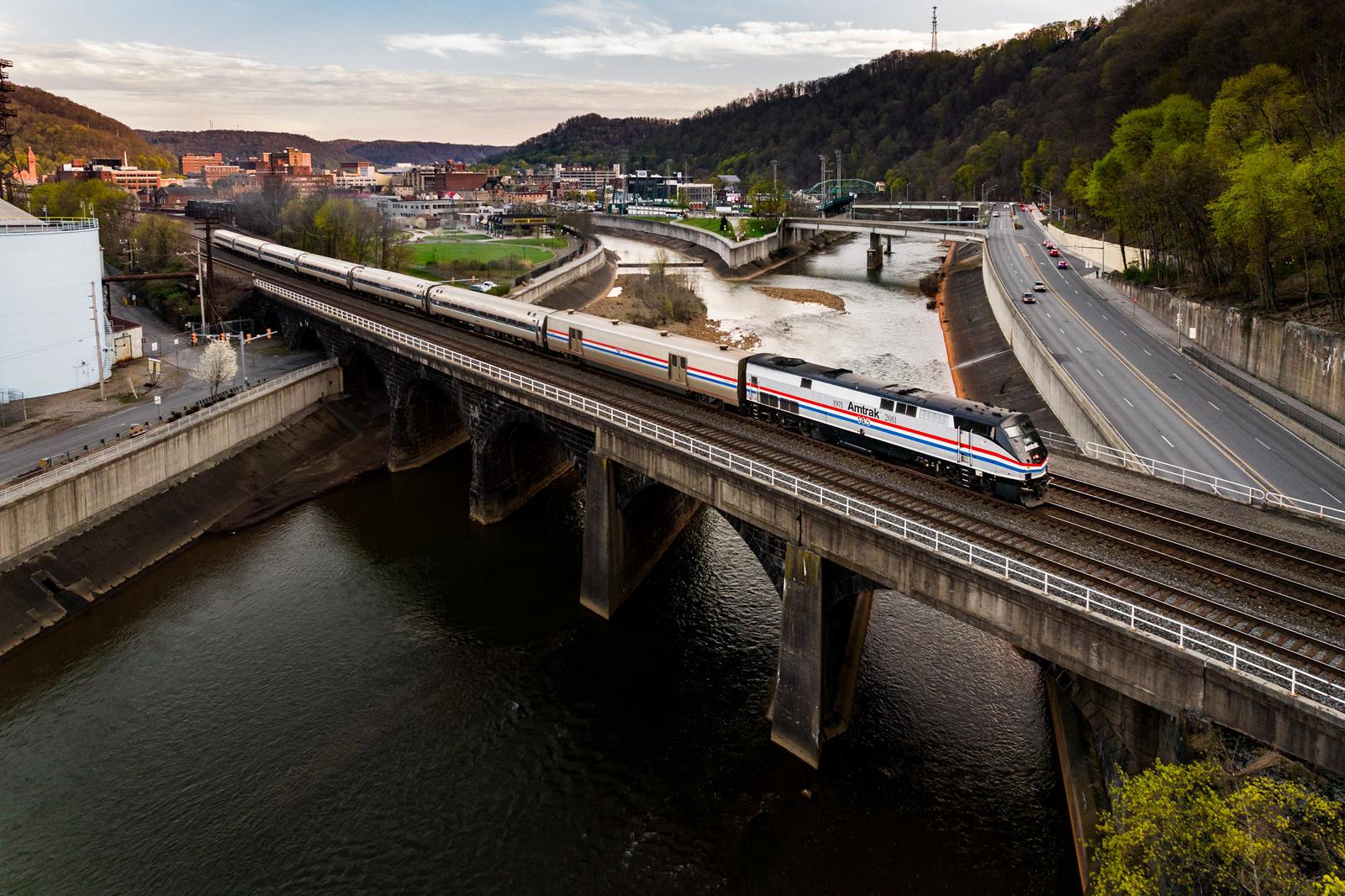 Amtrak's Pennsylvanian with 40th Anniversary Locomotive 145 crosses the Conemaugh River after stopping in Johnstown. 
